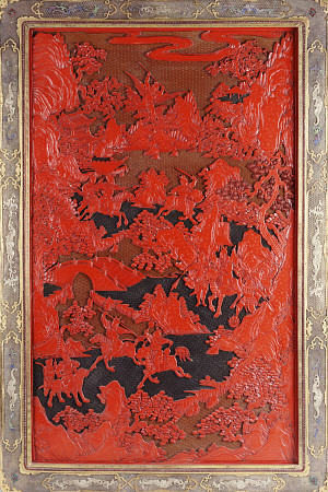 A Filigree Framed Red Lacquer Panel Depicting Warriors On Horseback And Mythical Animals In A Landca od 
