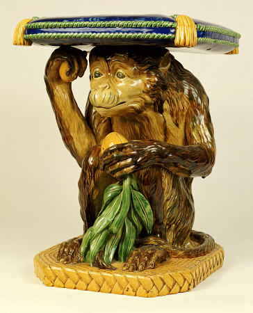 A Minton ''Majolica'' Garden Seat Modelled As A Crouching Monkey Supporting A Cushion On His Head, C od 