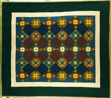 An Amish Pieced & Quilted Cotton Coverlet Worked In A Variation On The Nine Patch Pattern, od 