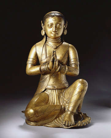 A Nepalese Embossed Gilt-Copper Figure Of A Worshipping Queen, Early 18th Century od 