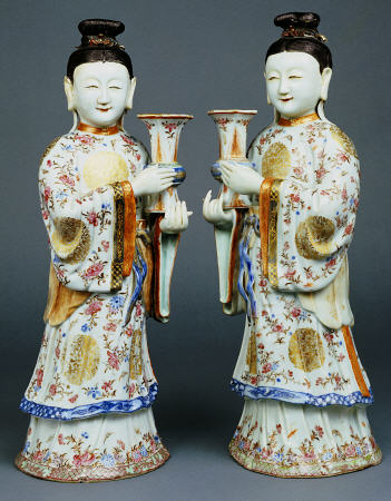 A Pair Of Famille Rose Candle Holders Modelled As Standing Ladies od 