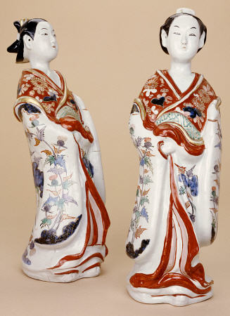 A Pair Of Large Imari Bijin, Vividly Decorated In Iron-Red, Green, Aubergine, Blue, And Black Enamel od 