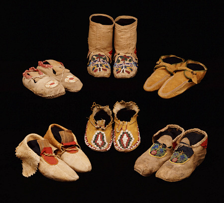A Selection Of American Indian Hide Moccasins From Varoius Tribes; Clockwise From Top Left - Upper M od 