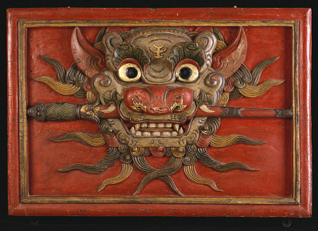 A Tibetan Polychrome Wooden Panel Carved In High Relief With A Kala Mask, 19th Century od 