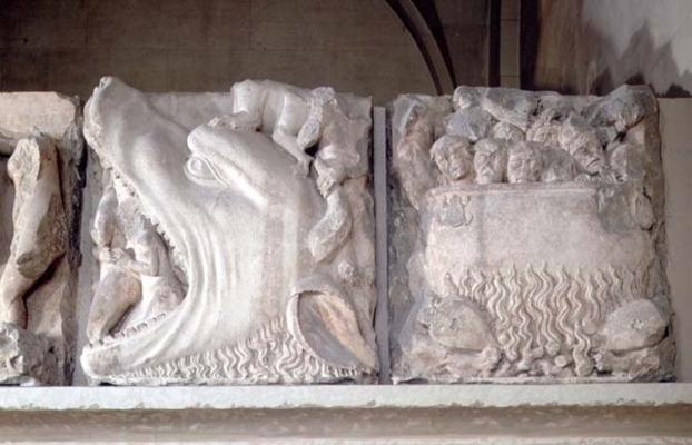 Bas-relief depiction of hell, showing figures being consumed by a monster and sinners boiling in a c od 