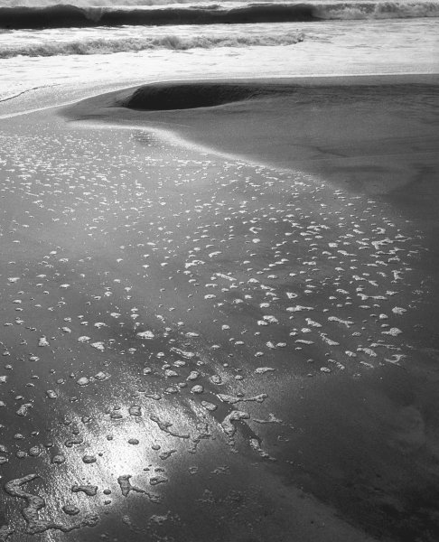 Foam on sand, Porbandar (b/w photo)  od 
