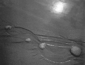Pebbles on sand, Porbandar (b/w photo) 