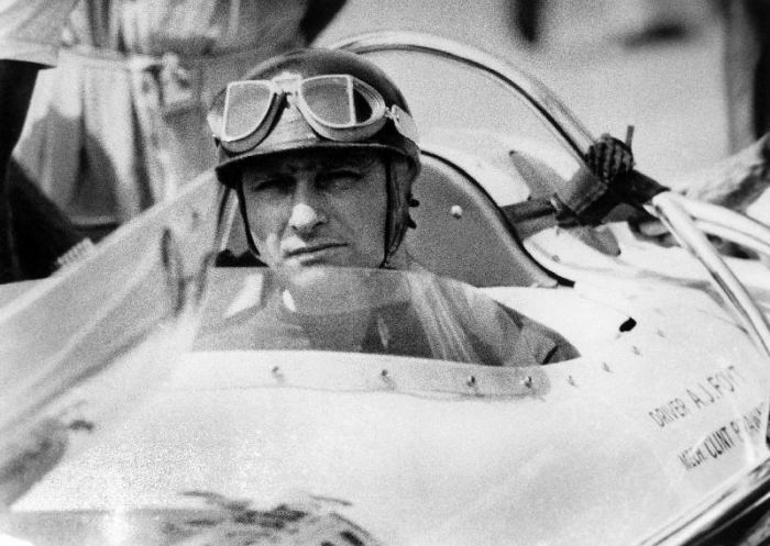 racing driver Fangio here at the wheel during race in Monza od 