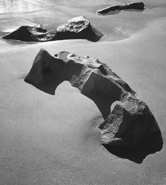 Rock on sand (b/w photo)  od 