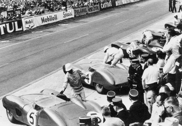 Start of the Le Mans 24 Hours, France, 1959. Roy Salvadori prepares to climb aboard his Aston Martin od 