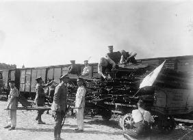 Soldiers Load Stretchers onto Train/1914
