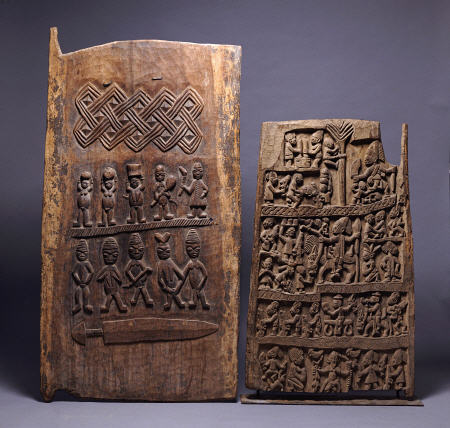 Two Yoruba Doors, One For A Shango Shrine, Both Carved In Relief With Various Figures od 