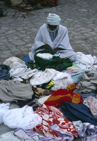 Vendor on the market place (photo)  od 