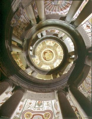 View of the stone spiral staircase looking up towards the ceiling, designed by Jacopo Vignola (1505- od 