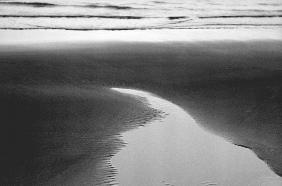 Water on sand (b/w photo) 
