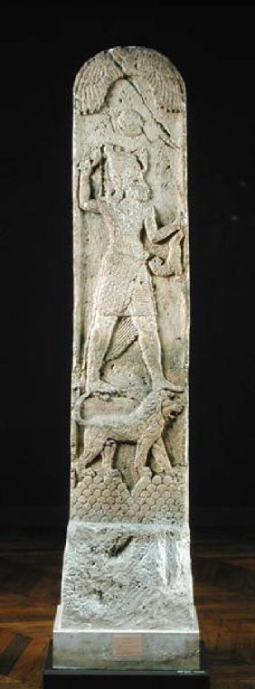 Votive stela depicting a god standing on a lion, from Amrith