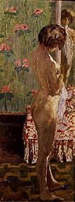Act of a woman in front of flowered wallpaper od Pierre Bonnard