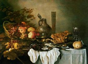 A Still Life With A Roemer, Oysters, A Roll And Meat On Pewter Plates, Fruit In And Around A Basket,