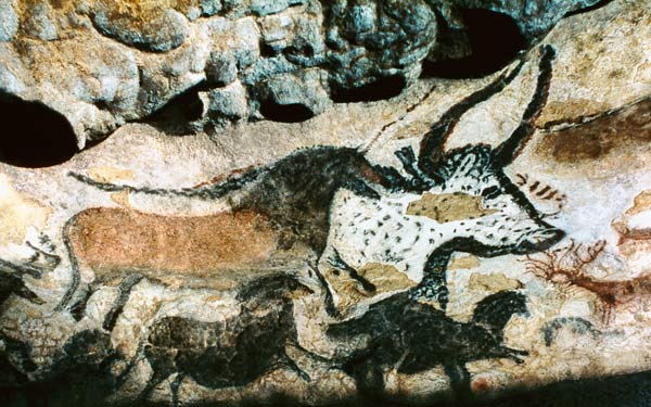 Rock painting of a bull and horses od Prehistoric