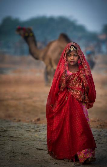 Nomad girl in red dress