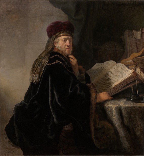 A Scholar Seated at a Desk (Scholar at his Study) od Rembrandt van Rijn