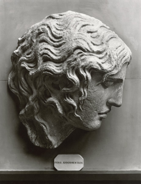 Head of a sleeping fury or Medusa dying od Roman