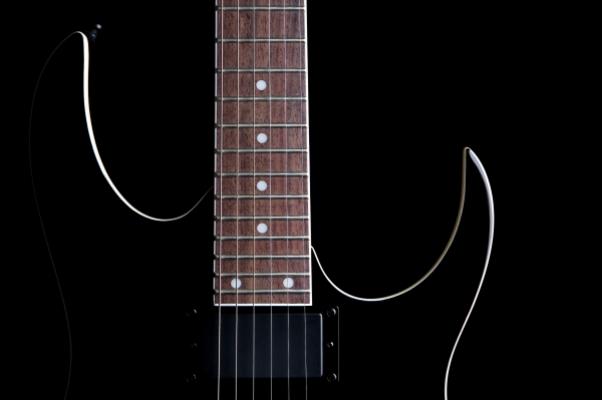 electric guitar silhouette isolated on b od Sascha Burkard