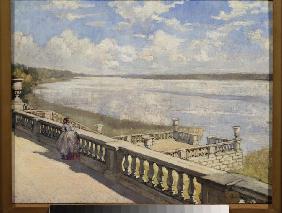 Sunny day. A lady at the balustrade