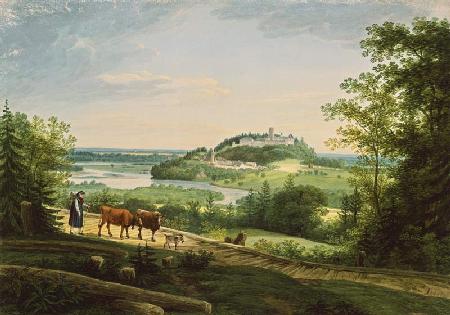 Farmer with cows in front of castle Neubeuern at the Inn