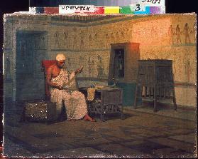 Ägyptischer Priester beim Studium einer Papyrus-Rolle