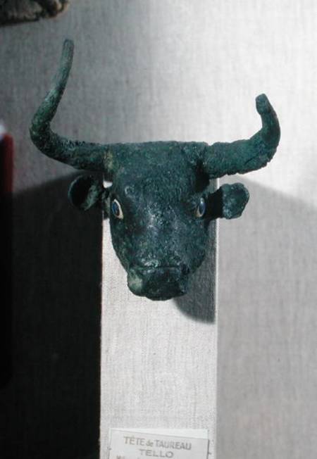 Head of a bull, with Royal  inscription, mount for a piece of furniture or for a harp, from Telloh ( od Sumerian