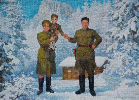 Happy Family. Kim Il-sung and his wife Kim Jong-suk with son Kim Jong-Il