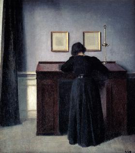 Woman, writing at a high desk.