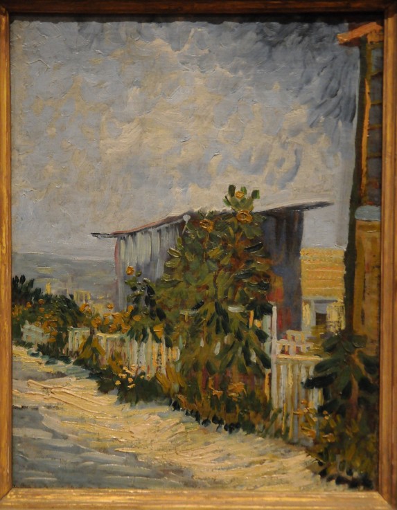 Shed at the Montmartre with sunflower od Vincent van Gogh